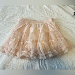 Blush pink tulle mini skirt.
